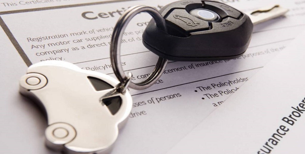 Car Keys On Insurance Documents